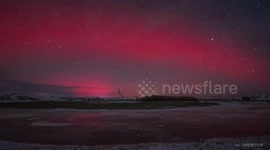 China: Auroras illuminate skies over northern Chinese cities in rare celestial display