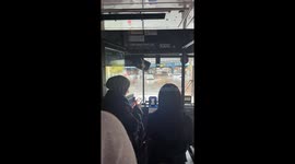 NYC Bus Drives Through Flooded Street