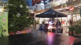 Celebrate the cast the Kings head theatre's pantomime and the 'Christmas light switch on' in Angel Central, London, England