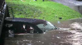 Birmingham Flood Shock: Reckless Driver's 4x4 Submerged in River Cole During Storm Claudia