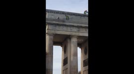 Pro-Palestinian activists protest atop Brandenburg Gate in Berlin, Germany