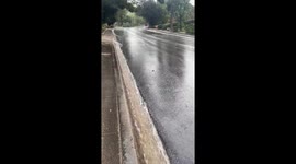 Heavy gutter runoff during continuous rainfall in Thousand Oaks, USA