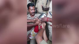 Officials rush to help 1.5-year-old with steel container stuck on head, child freed safely within 30 minutes