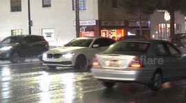 US, Los Angeles: Burbank Rain With Vehicle Spin Out Caught On Camera