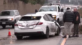 US, Los Angeles: Glendale Vehicle Overturns Amid Rainstorm