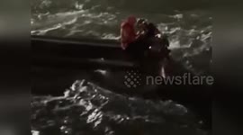 US: Father And Son Saved After Clinging To Overturned Boat For 2 Hours