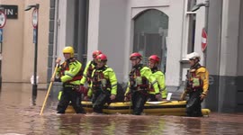 RIVER MONNOW FLOODS- WOMAN RESCUED BY FIRE AND RESCUE SERVICE IN MONNOW STREET MONMOUTH