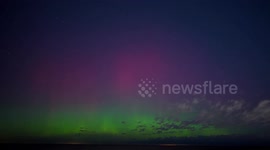 Northern lights shimmer over Lake Erie in Ohio, USA