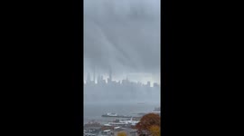 Early snowfall over New York City seen from New Jersey, USA