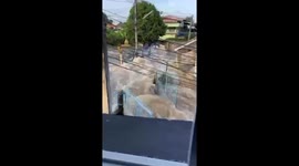 Flood sweeps through village as heavy rain hits Thailand