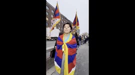 A Tibetan woman named Tashi shares her story at a London protest against the proposed Chinese mega embassy.