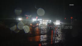 US, Los Angeles: Castaic 2 Occupied Vehicles Trapped In Canyon Fire Burn Area Runoff