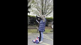 Protesters outside the West Drayton migrant hotel chant a well known song with rewritten anti migrant lyrics.