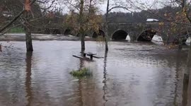 Riverside park submerged by rising River Nore in Inistioge, County Kilkenny, Ireland