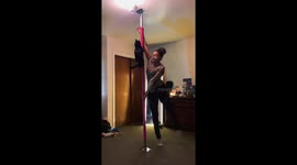 Diva cat and her mom practice a pole dancing routine, you can see the cat climb then pat the owners face for a kiss !