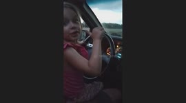A heartwarming moment captured as our granddaughter, Avery, drives on a quiet back road sitting safely on her Papa's lap. The video shows the fun and instruction shared as she gets a first taste of driving with her grandparents.
