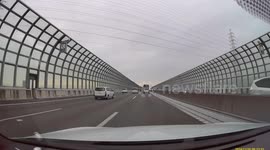 Ladder falls from vehicle and breaks windshield in Osaka, Japan