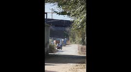 Electric train appears suspended on elevated track in Hebei, China