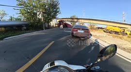 Oversized truck gets wedged under bridge in Tianjin, China