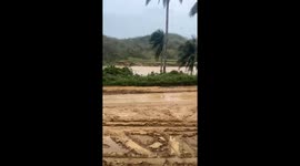 Firefighters use river to replenish truck's hose tank