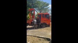 Truck sinks into garden while doing repairs at home
