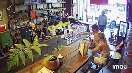 Couple shocked as tourist spits on them and takes items from restaurant