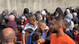 Hot meals distributed to displaced Palestinians in Gaza’s Nuseirat refugee camp