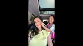 Girl Puts Stickers Everywhere