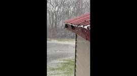 Graupel bursts blanket the area in Altmar, New York, USA
