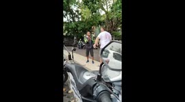 Drunk Australian tourist fights motorcycle rider over 'stolen baseball cap' in in Bali