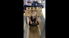 Barbecue stick bridge made in school experiment holds an impressive load
