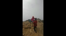 Hiker proposes to girlfriend when they reach mountain peak
