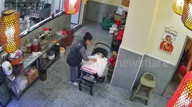 Hero diner rushes to save toddler falling from pushchair in Chinese restaurant