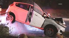 US, Los Angeles: Santa Clarita Slick Roads Lead To Car Levitating On Crashed Hydrant