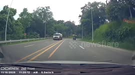 Wheel detaches from moving minivan and rolls across road