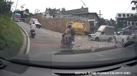 Two tourists injured as bus rolls downhill and crashes into car