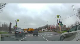 Electric unicycle rider hits jogger on pavement then falls onto moving car
