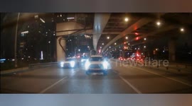 Driver using phone fails to stop before hitting car in front