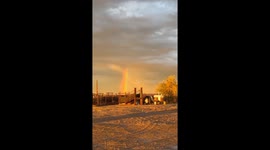 Rainbow Over a Tractor