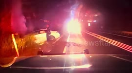 US: Officers Drag Unconscious Driver From Burning Car In New Jersey