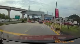 Scaffolding under railway collapses narrowly missing drivers in Malaysia
