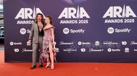 Abbie Chatfield and Keli Holiday (Adam Hyde) arrive on the red carpet for the 2025 ARIA Awards, Sydney, Australia