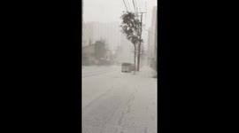 Heavy snow blankets roads in Sapporo, Japan