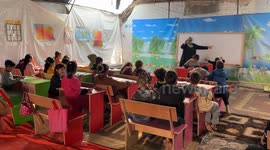 Gaza children attend classes in makeshift tents amid war