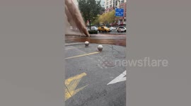 Boiling hot water shoots skyward as heating main explodes on busy street