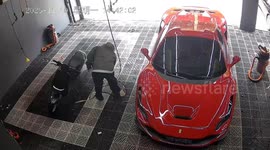 Electric scooter suddenly accelerates and almost smashes into parked Ferrari