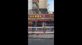 Plate-throwing street performance gone wrong in Xinjiang, China
