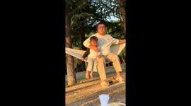 Dad and son fall from fabric hammock in Jiangsu, China