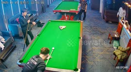 Billiard shot accidentally hits player in the face at billiard studio, Jilin, China
