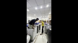 Man Falls While Running on Washing Machines